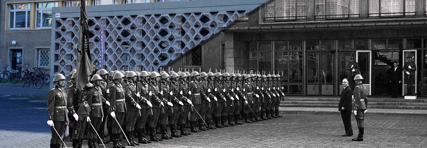Das Bild ist schräg in der Mitte geteilt: Die Hälfte oben links zeigt ein aktuelles Foto der Vorderfront von Haus 1 mit dem Sichtschutz. Die Hälfte unten rechts zeigt eine Reihe von Soldaten in Uniformen, vor denen Erich Mielke steht.